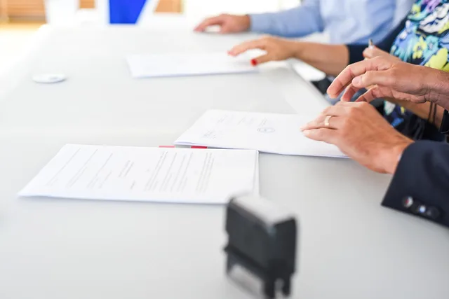 agreement, contract signing, table, hands, sign, contract, paper, paper work, meeting, business, closeup, agreement, contract, contract, contract, contract, contract. Three ways the sponsorship rates market size in England gets overstated