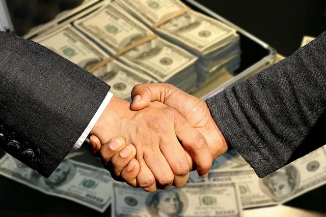 conclusion of contract, handshake, trade, business, profit, black money, control, treasury, sale, to buy, selling, commercial, shopping, money case, currency, money, contract, dollar, shaking hands, handshake, profit, selling, selling, selling, selling, selling. An illustrative North West sponsorship floor framework